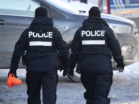 Montreal police investigate a crime scene.