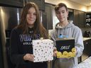 Hailey Charon, 15, and her brother Spencer Charron, 14, show  