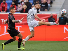 CF Montreal defender Rudy Camacho (4) plays the ball in front of New York Red Bulls forward Patryk Klimala during the first half at Red Bull Arena on Saturday, Oct. 30, 2021, Harrison, NJ.
