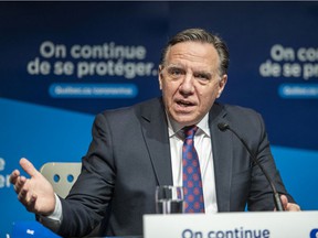 Prime Minister François Legault answers a question during a press conference in Montreal on Tuesday, April 6, 2021.