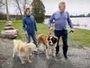 Former Montreal Canadian Chris Nilan and his girlfriend Jaime Holtz walk their dogs Adele and Bodhi, left, near their home in Terrasse-Vaudreuil, west of Montreal, on May 9, 2019.