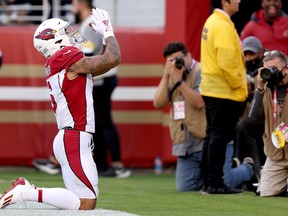 James Conner of the Arizona Cardinals celebrates after scoring a touchdown during the third quarter against the San Francisco 49ers.