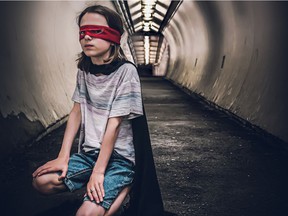 Vincent Boyer's photo featured on Dorval in One Click!  The exhibit is of her 10-year-old son wearing a red superhero cape and mask, reflecting the masks that people have had to wear since the beginning of the COVID-19 pandemic.
