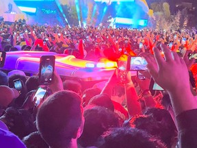 An ambulance is seen in the crowd during the Astroworld music festival in Houston, Texas, USA, on November 5, 2021 in this still image obtained from a social media video.