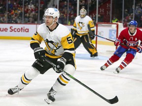 Pointe-Claire native Michael Matheson plays defense for the Pittsburgh Penguins during the game against the Canadiens in Montreal on November 18, 2021.