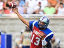 Anthony Calvillo of Montreal Alouettes throws a pass against the Winnipeg Blue Bombers in Montreal on July 4, 2013.