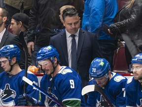 Canucks head coach Travis Green and the players can't hide their dejection after Colorado Avalanche scored a goal in the third period Wednesday at Rogers Arena in the Avs' 4-2 win.