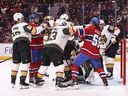 Vegas Golden Knights and Montreal Canadiens players trade blows during the first period at Bell Center.