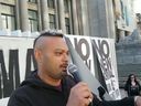 File Photo: Makhar Singh Parhar speaks at an anti-mask rally in downtown Vancouver.