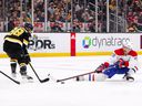 Canadiens defender Jeff Petry (26) defends Boston Bruins right wing David Pastrnak (88) during the second period at TD Garden in Boston on Sunday, Nov. 14, 2021.