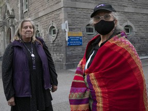 Kawenaa, left, and Kahentinetha are members of the Mohawk Mothers group.  The group is demanding a forensic and archaeological investigation of the former site of the Royal Victoria Hospital, which they say contains remains of a pre-colonial Iroquois village and may contain unmarked graves.