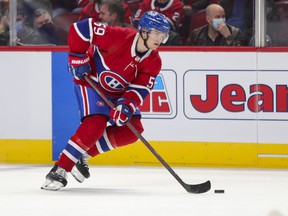Canadiens' Mattias Norlinder handles the puck during the first period in Montreal on Thursday, Nov. 18, 2021.