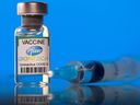 This illustration image taken on March 19, 2021 shows a vial labeled with Pfizer-BioNTech's coronavirus disease vaccine (COVID-19).