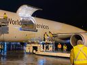 A UPS plane with thousands of pediatric doses unloads in Hamilton on November 21, 2021.