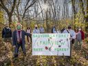 Members of Save the Fairview Forest gather in the wooded area west of the Fairview Pointe-Claire Mall on Tuesday.  Cadillac Fairview wants to develop forests.