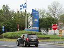A car from New Jersey crosses into Quebec at the border crossing, Monday, Aug. 9, 2021, in Lacolle, Que., South of Montreal.  A Canadian who has been living in the United States asked Paul Delean about some of the tax implications for retirees returning to Quebec.
