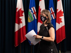 Dr. Deena Hinshaw, Alberta's chief medical officer for health, leaves after a press conference on the COVID-19 pandemic in the Alberta Legislature press room in Edmonton on July 28, 2021.