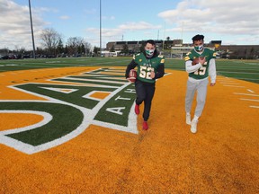 St. Clair College Fratmen catcher Jared Hayes-Williams, pictured right with teammate Josh Allen, scored three touchdowns in Saturday's semifinal over Quinte.
