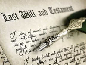 Last will and testament document with pen and handwriting