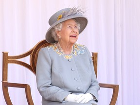 Queen Elizabeth II attends a military ceremony at Windsor Castle Quadrangle to mark her official birthday on June 12, 2021 in Windsor, England.