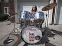 11-year-old Addi Bonadonna plays her newly acquired Slingerland vintage drums in front of her home in Windsor on August 30, 2021.