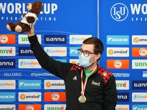 Canadian Laurent Dubreuil celebrates with the silver medal on the podium after the 500-meter race in Tomaszow Mazowiecki, Poland, on Sunday.