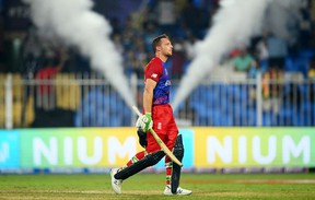 Jos Buttler, England's goalkeeper, lit up the skies with a century against Sri Lanka to guide England into the next round of the Twenty20 World Cup.  fake images