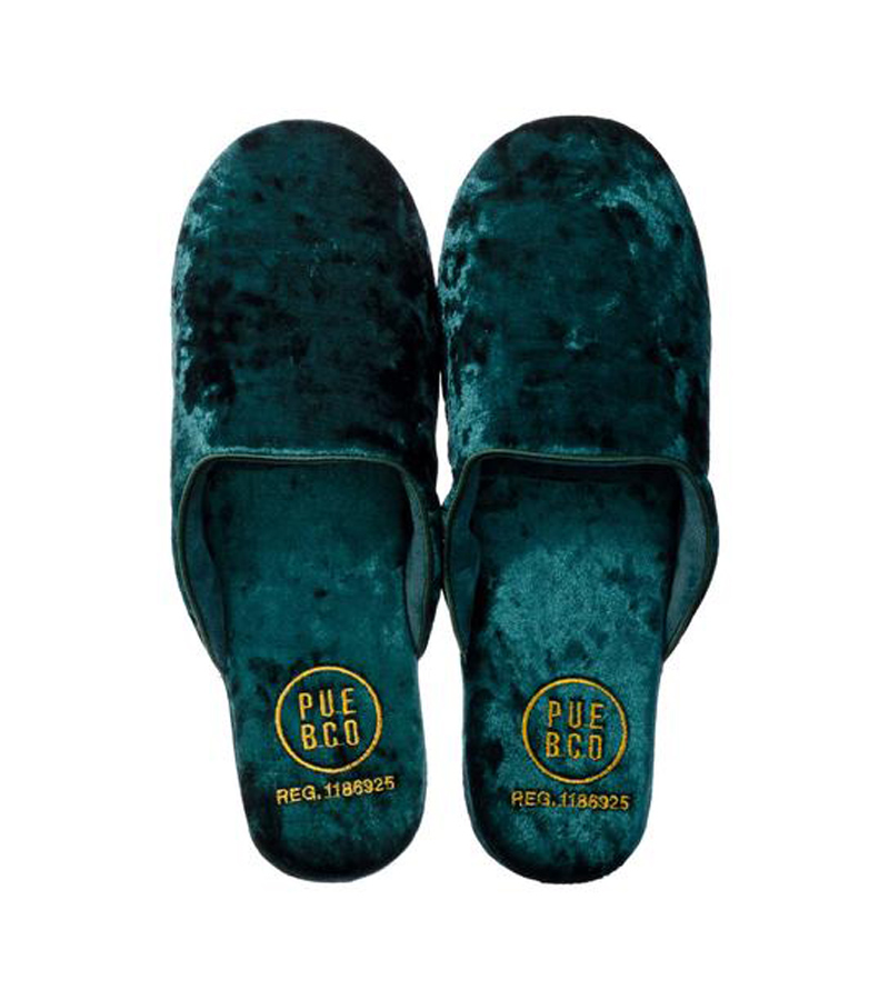 Green velvet slippers with gold details inside 