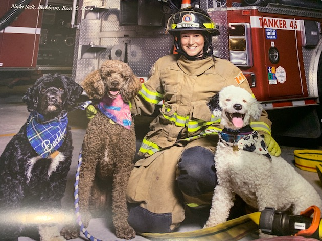 Nicki Selk poses with Beckham, Bear and Nova