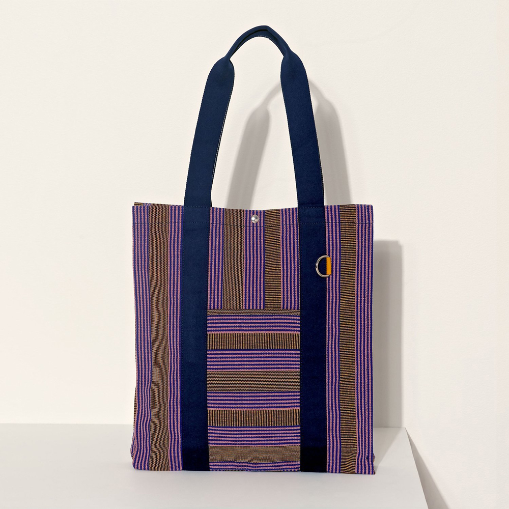 A colorful striped shopping bag