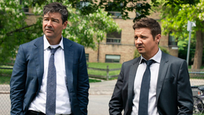 Kyle Chandler and Jeremy Renner in a scene from the mayor of Kingstown.
