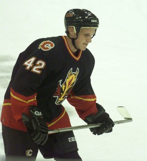 A fresh-faced Dion Phaneuf plays in his first game as the Calgary Flame in 2005. Phaneuf scored 20 goals in his rookie season, a feat he has never equaled again in his 14-year career.  ARCHIVES LEAH HENNEL / POSTMEDIA