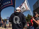 A person wears a QAnon sweatshirt during a pro-Trump rally on October 3, 2020 in the Staten Island district of New York City.