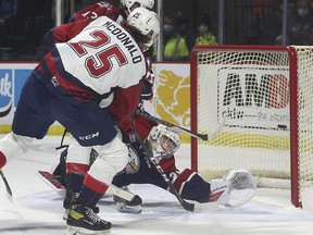 Windsor Spitfires forward Kyle McDonald scores on the power play during Friday's 6-5 loss to Saginaw Spirit at the WFCU Center.