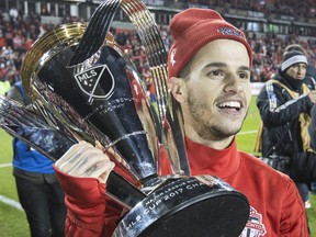 Sebastian Giovinco celebrates with the Cup after Toronto FC won the MLS Cup in Toronto, Ontario.  on December 9, 2017.