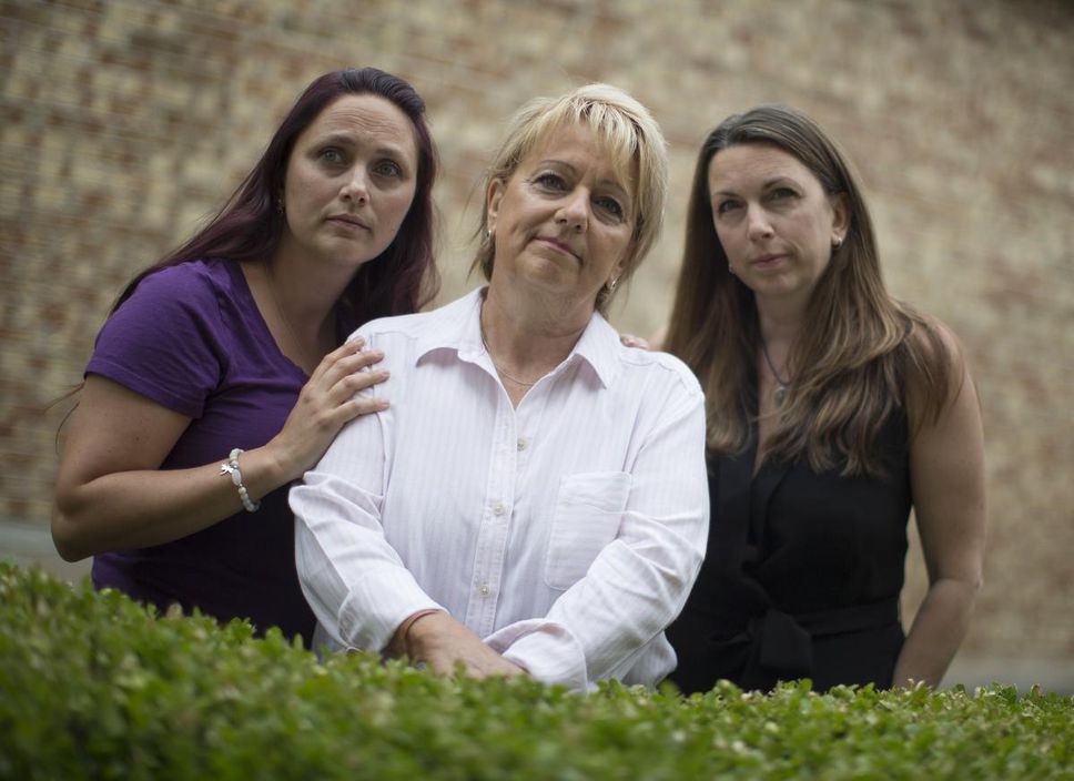 Annmarie Chorley, with her daughters Shannon Kenzaki, left, and Marlene Chorley.  The family is still coping with the loss of Father Rob.