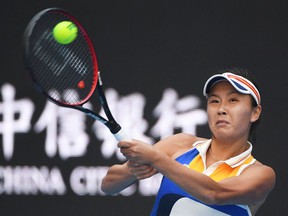 This file photo taken on October 4, 2017 shows Peng Shuai of China returning during her women's singles match against Monica Nicolescu of Romania at the China Open tennis tournament in Beijing.