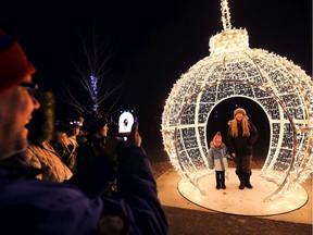 David Bechard snaps a photo of Aivree Ridley and Katelyn Bechard at Bright Lights Windsor in this 2018 file photo.