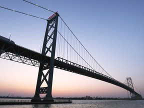 The silhouette of the Windsor side of the Ambassador Bridge is shown in this April 2021 file photo.