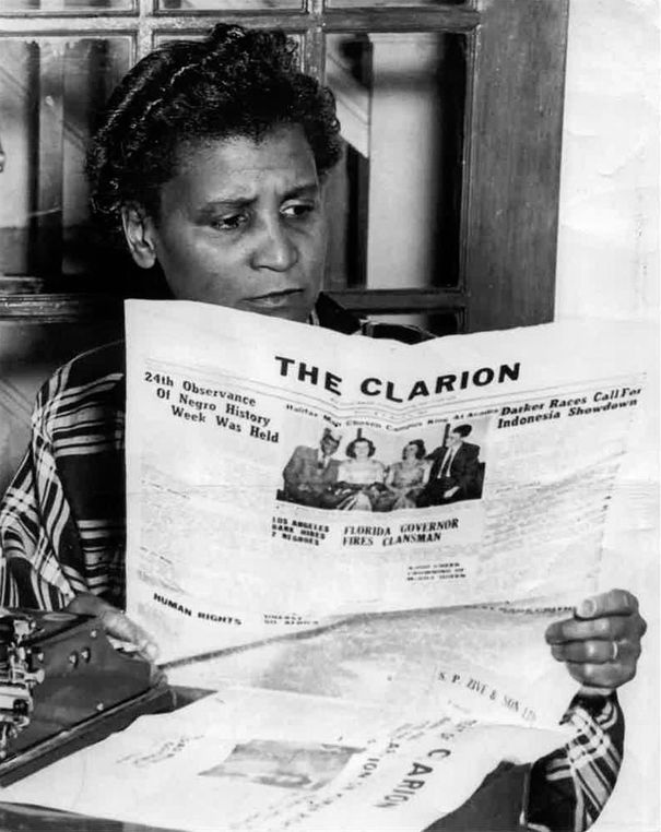 Nova Scotia journalist and civil rights activist Carrie Best is pictured reading a copy of her newspaper, The Clarion, in this undated photograph.