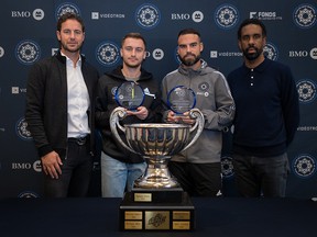 Djordje Mihailovic and Rudy Camacho receive their trophies as Player and Most Valuable Defensive Player of the Year from CF Montréal, respectively, on November 23, 2021.