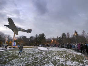People are pictured at the annual Hanukkah Menorah lighting ceremony at Jackson Park in Windsor on Sunday, Nov. 28, 2021.