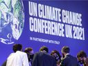 Delegates speak during the United Nations Climate Change Conference (COP26) in Glasgow, Scotland, on Saturday, November 13, 2021.  