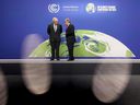 British Prime Minister Boris Johnson and United Nations Secretary General Antonio Guterres in conversation during arrivals at the UN Climate Change Conference (COP26) in Glasgow, Scotland, on Monday.