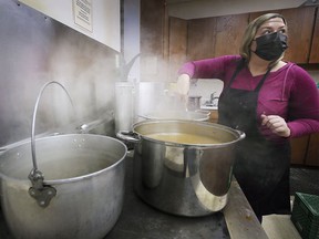 It was the 75th Annual Cottam United Church Turkey Dinner on Thursday, November 25, 2021. More than 100 volunteers helped cook 50 turkeys for 1,200 meals sold, with an additional 200 for the Windsor Downtown Mission.  Nicole Bolton makes salsa during the event.