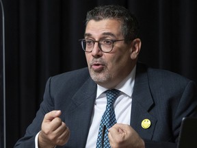 Daniel Paré, director of the vaccination program in Quebec, answers questions during a press conference on the COVID-19 pandemic at the legislature in Quebec City, Tuesday, November 23, 2021.