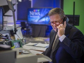CTV News Windsor anchor Jim Crichton works at his desk on his penultimate day on the job before retiring, Thursday, Nov. 25, 2021.