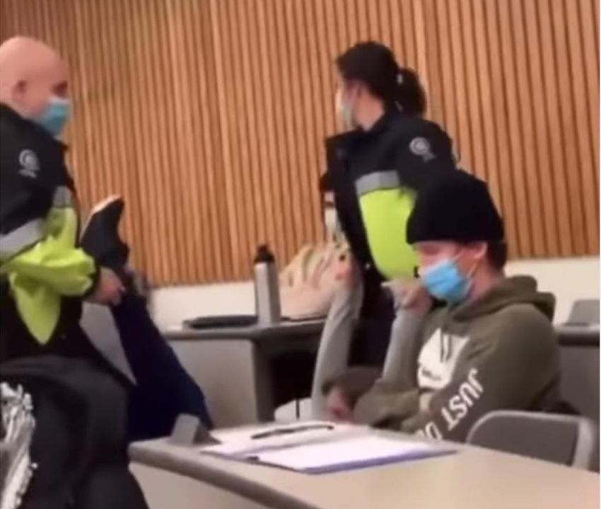 Western student Harry Wade appears in an Instagram video screenshot that campus police are taking outside of class in a dispute over the university's COVID-19 vaccination policy.