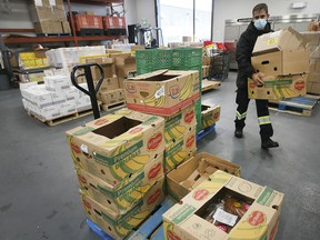 WINDSOR, ONTARIO.  OCTOBER 29, 2021: Mohamed Chreif, a volunteer from the Windsor Unemployment Assistance Center, shows up in the organization's food bank area on Friday, October 29, 2021.