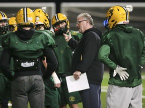 St. Clair Fratmen coach Mike Morencie talks to players during Wednesday practice in preparation for Saturday's game with the London Beefeaters for the OFC title.